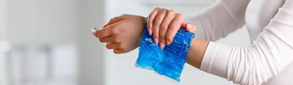 Person using ice pack to relieve pain and reduce inflammation